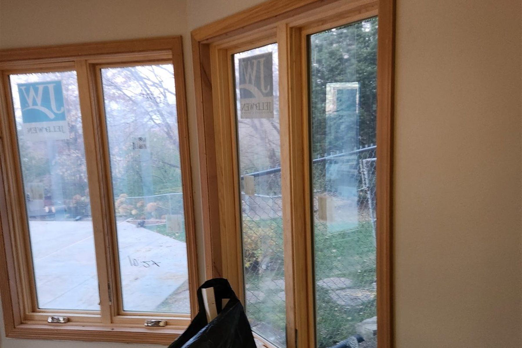 Window trim install, by New West Co