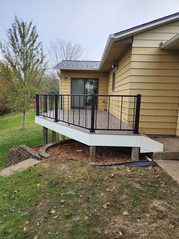 Raised composite deck on a split level home